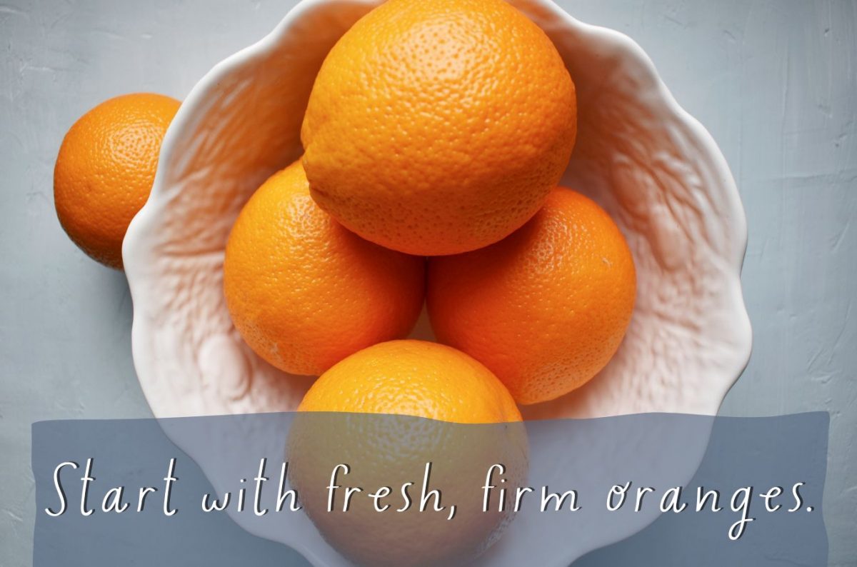 White bowl with fresh oranges